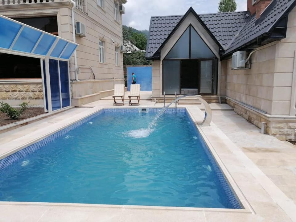 Swimming pool, sunbed