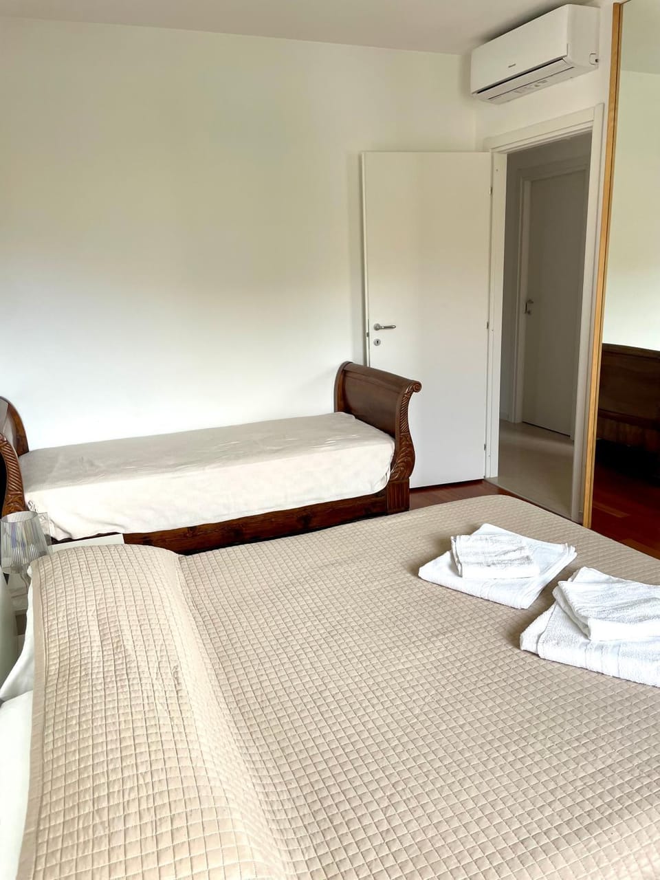 Bed, Bedroom, towels, wardrobe, air conditioner