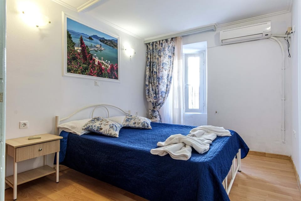 Bed, Photo of the whole room, Bedroom, towels, air conditioner