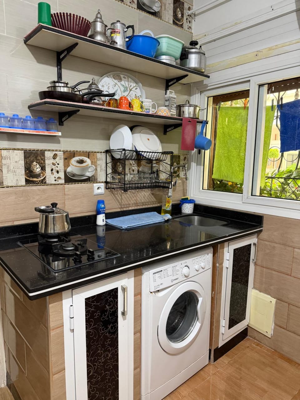 Kitchen or kitchenette, washing machine