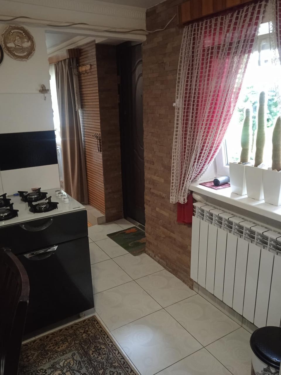 Kitchen or kitchenette, stove