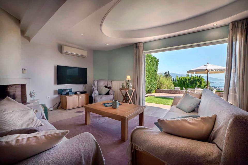 Living room, Seating area, Garden view, Pool view, Sea view