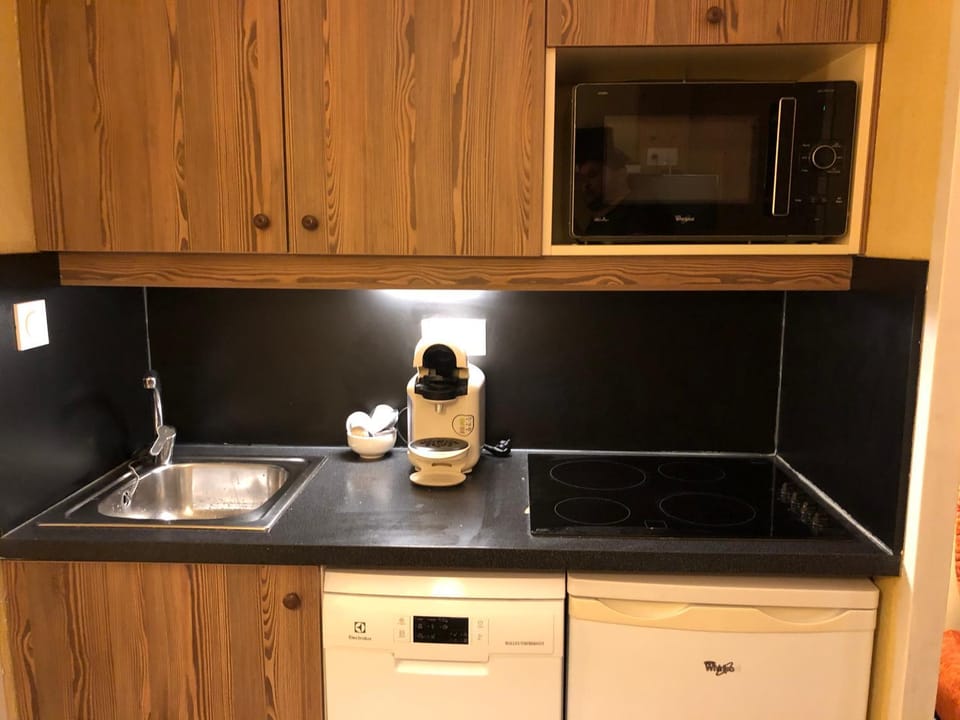 Kitchen or kitchenette, stove