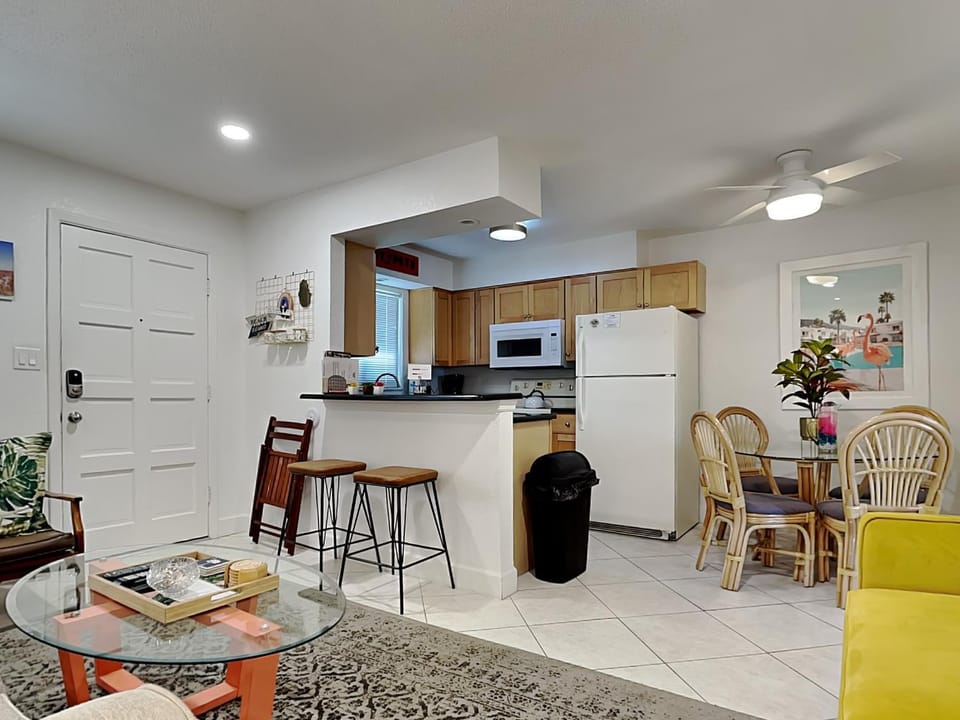 Kitchen or kitchenette, Living room, Seating area, Dining area, furniture, microwave, kitchen