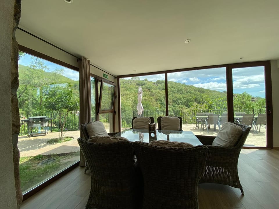 Facade/entrance, Natural landscape, Living room, Seating area, Dining area, Mountain view