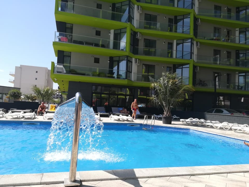 Facade/entrance, Beach, Pool view, Sea view, Swimming pool, group of guests