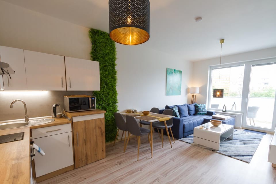 Kitchen or kitchenette, Living room, Seating area, Dining area