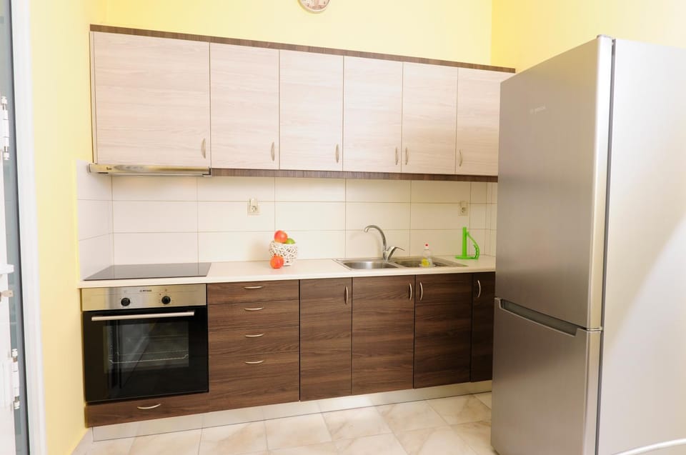 Kitchen or kitchenette, oven, stove