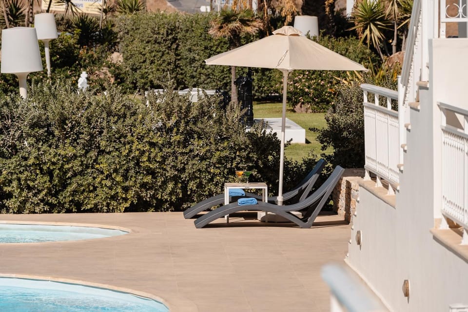 Property building, Patio, Staff, Spring, Day, Night, People, Summer, Garden, View (from property/room), Other, Decorative detail, Autumn, Text overlay, Guests, Garden view, Landmark view, Pool view, Street view, Area and facilities, Swimming pool, Seasons, Time of day, Sunrise, Sunset, children, young children, older children, group of guests, Family, Parking, concierge, furniture, internet, locker, safe, sunbed, towels, VIP, wedding, air conditioner