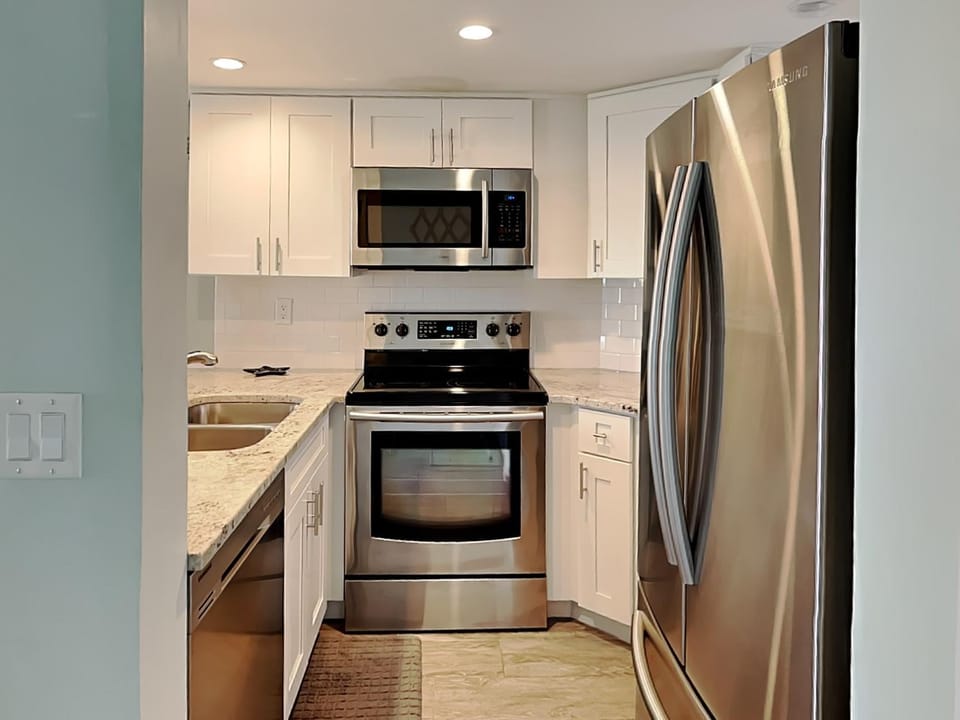 Kitchen or kitchenette, microwave, oven, stove, kitchen