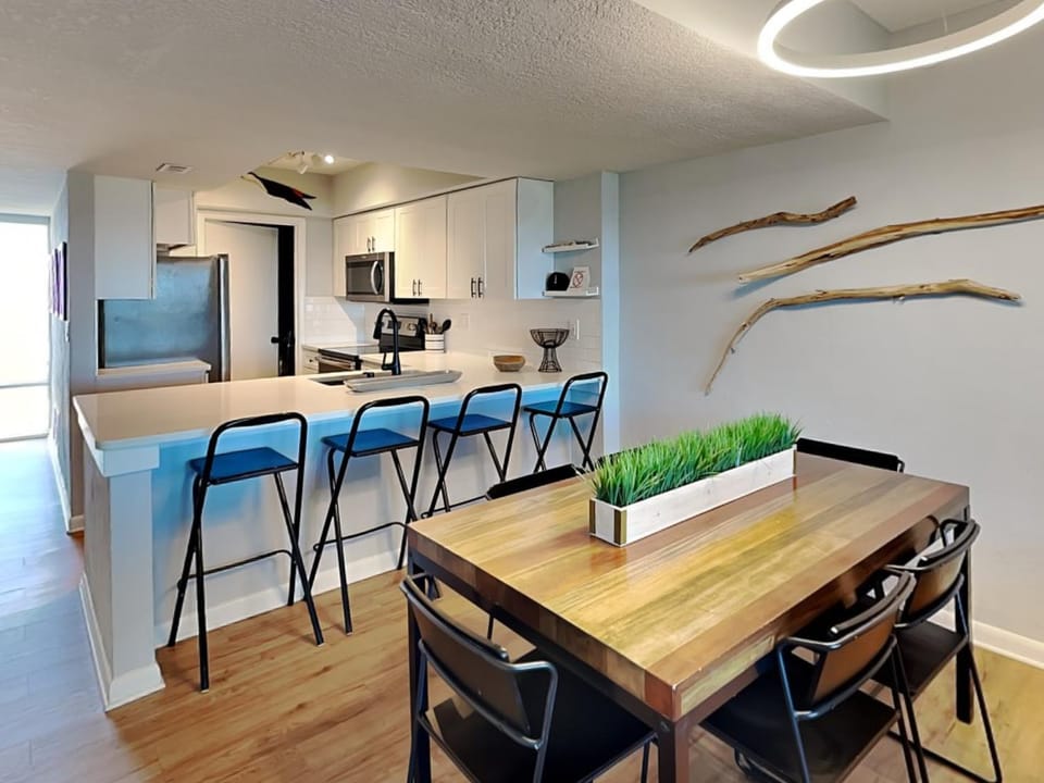 Kitchen or kitchenette, Seating area, Dining area, furniture, microwave, kitchen