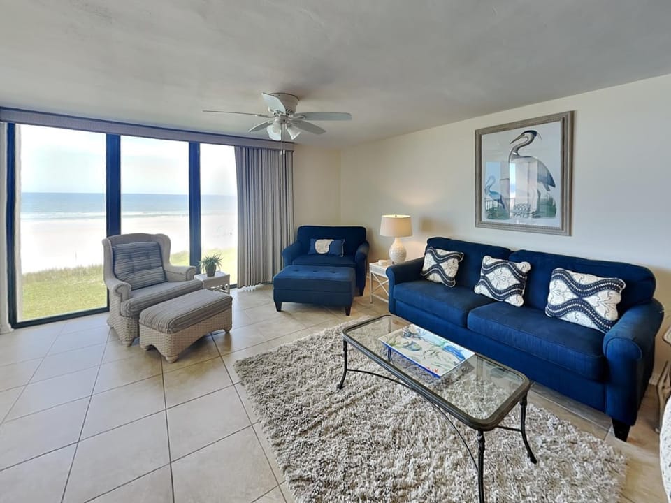 View (from property/room), Living room, Seating area, Beach, Sea view, furniture