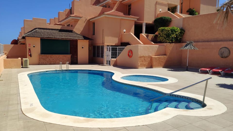 Swimming pool, sunbed