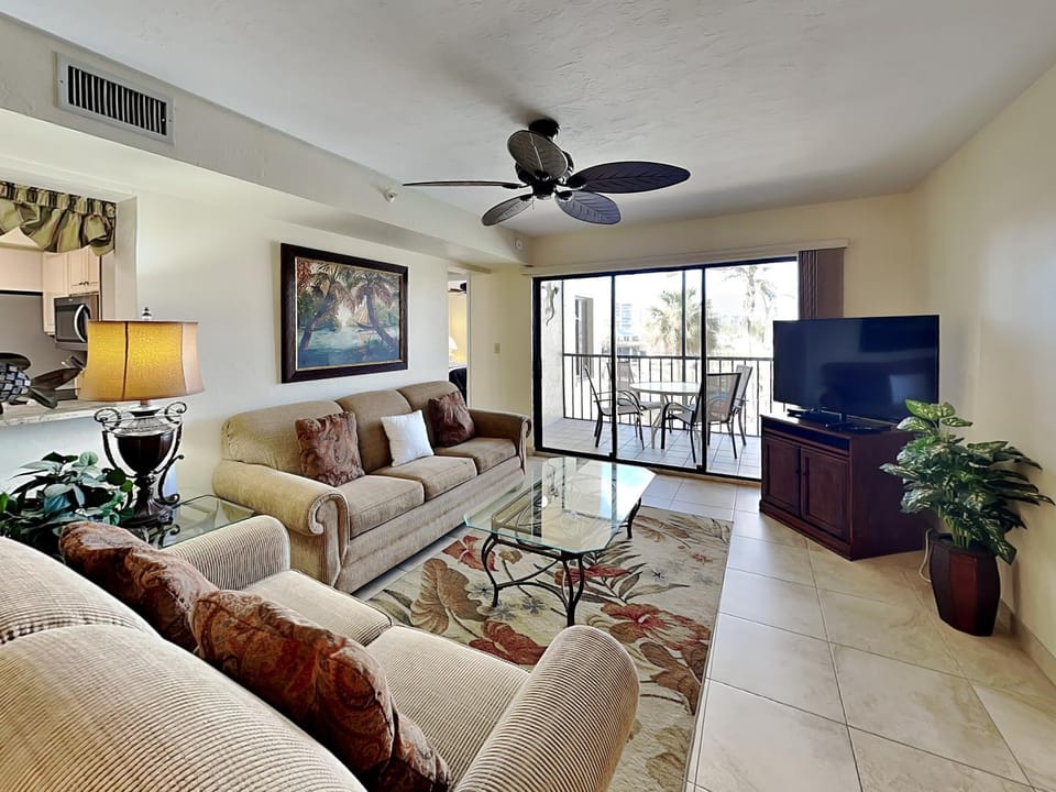 TV and multimedia, Balcony/Terrace, Kitchen or kitchenette, Living room, Seating area, furniture, air conditioner