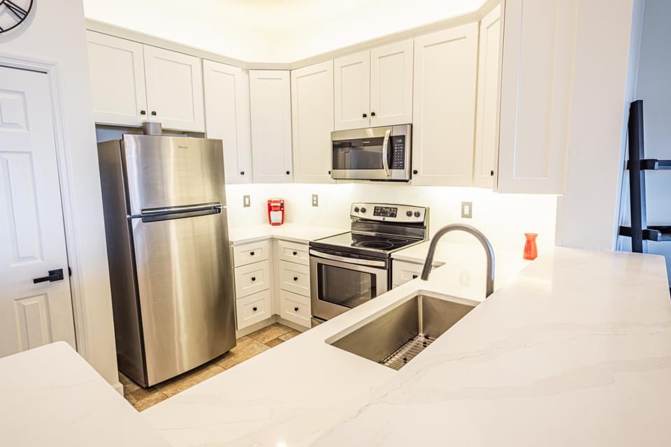 Kitchen or kitchenette, microwave, oven, stove, kitchen