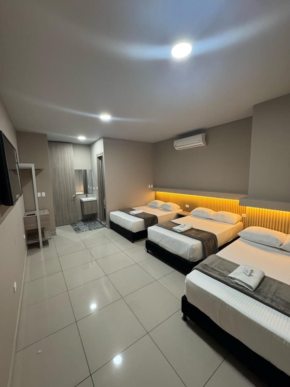 Bed, towels, air conditioner