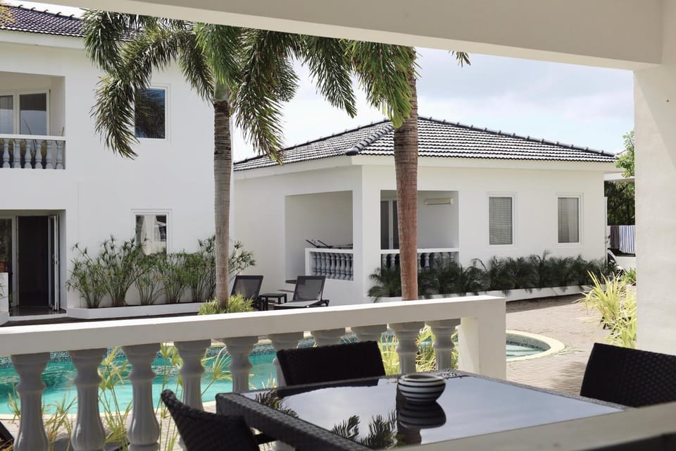 Property building, Patio, Balcony/Terrace, Seating area, Pool view