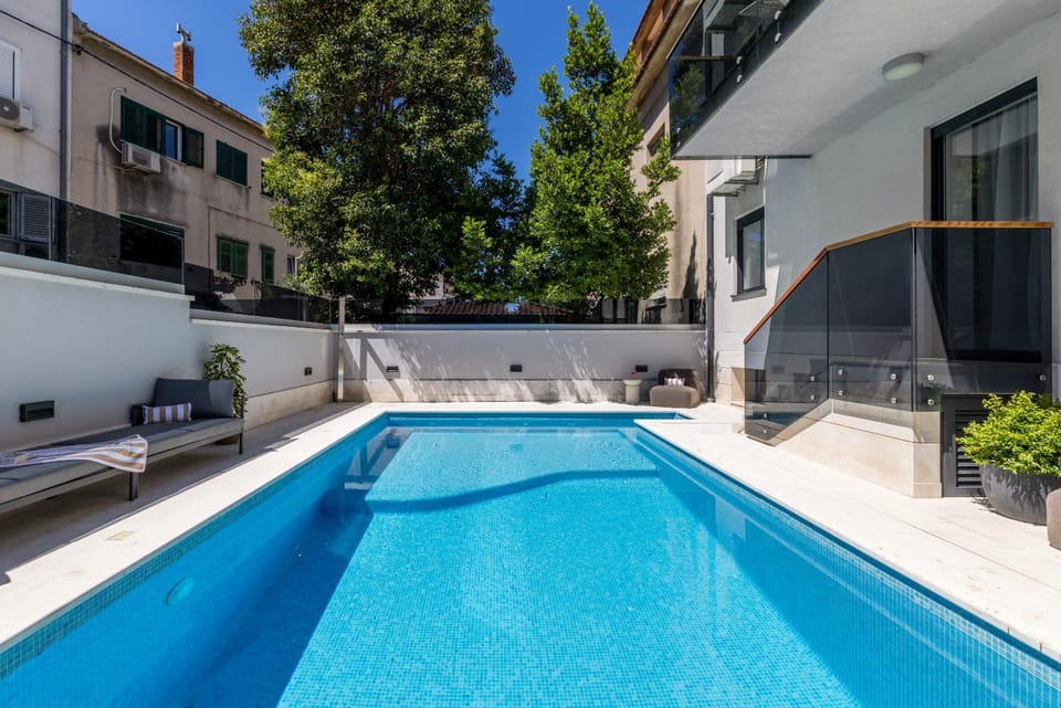 Property building, Day, Pool view, Swimming pool