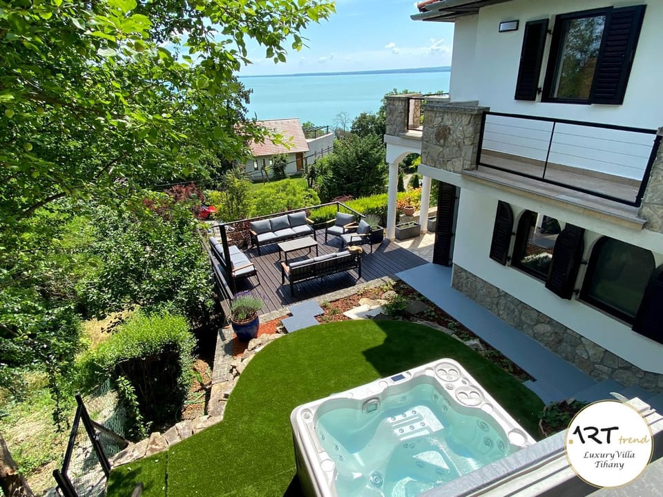 Property building, Patio, Natural landscape, View (from property/room), Balcony/Terrace, Garden view, Lake view, Swimming pool