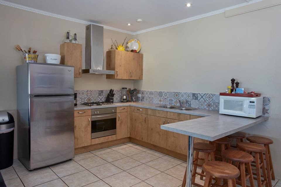 Kitchen or kitchenette, oven, stove, toaster