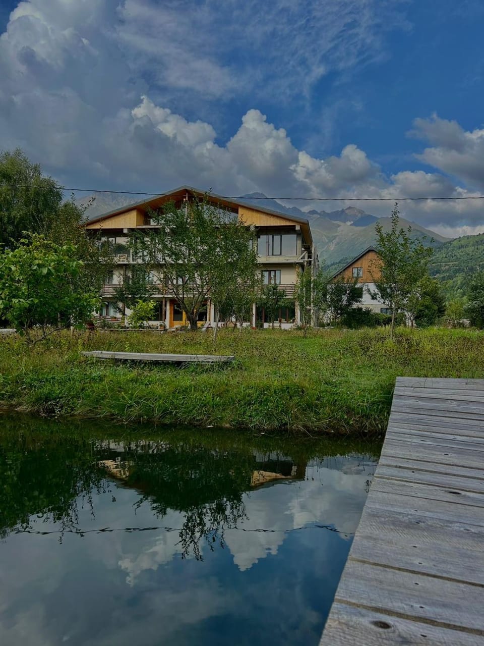 Property building, Spring, Day, Natural landscape, Lake view, River view