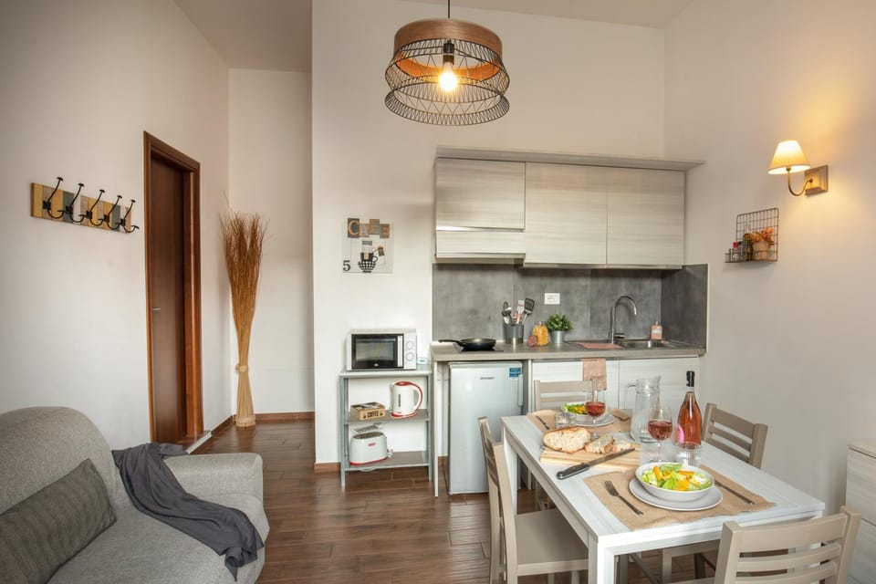 Kitchen or kitchenette, Living room, Seating area, Dining area