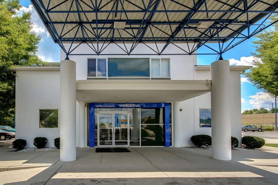 Property building, Facade/entrance, Day, Property logo or sign, On site, Time of day