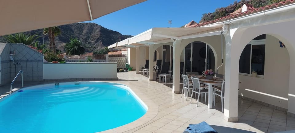 Property building, Dining area, Swimming pool