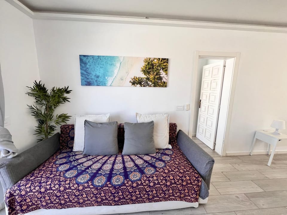 Bed, Living room, Seating area