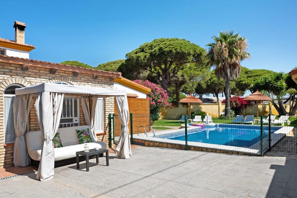 Property building, Living room, Swimming pool