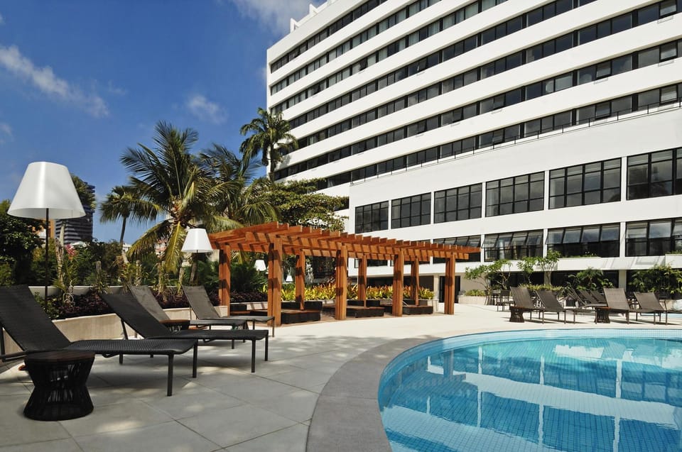 Property building, Facade/entrance, Day, Pool view, Swimming pool, sunbed