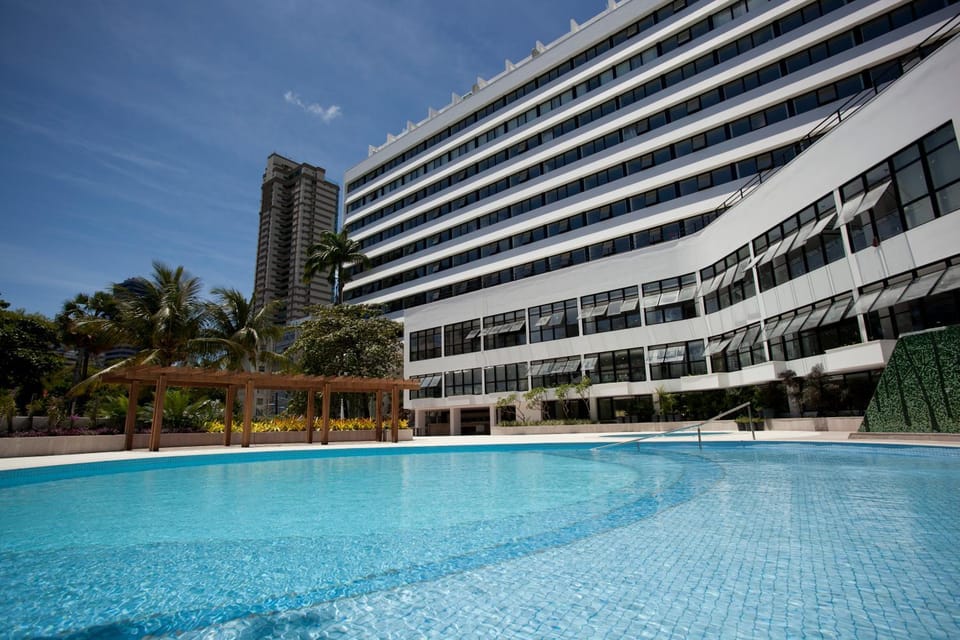 Property building, Facade/entrance, Day, Pool view, Swimming pool
