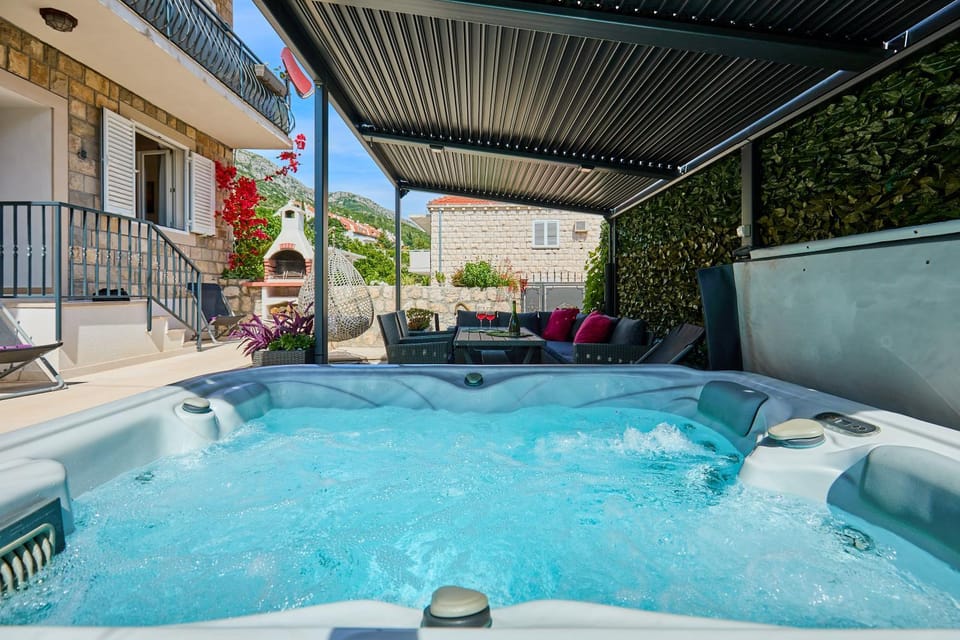 Patio, Day, Hot Tub, sunbed