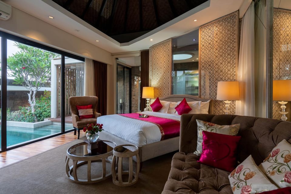 Bed, Living room, Seating area, Bedroom, Pool view