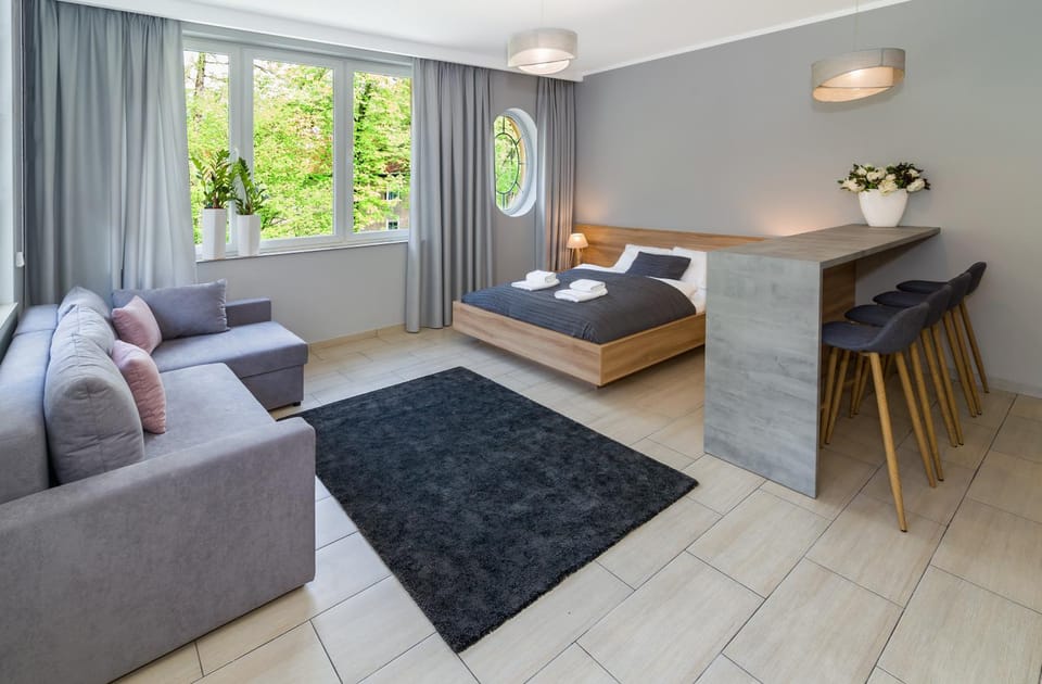 Bed, Living room, Seating area, Bedroom