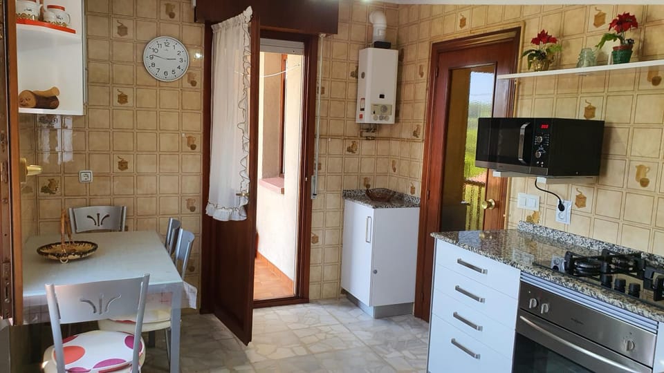 Kitchen or kitchenette, stove
