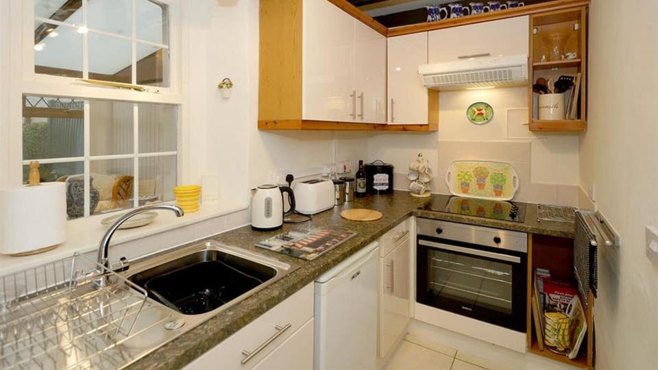 Kitchen or kitchenette, oven, stove, toaster