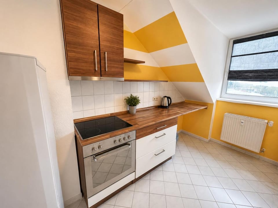 Kitchen or kitchenette, oven, stove