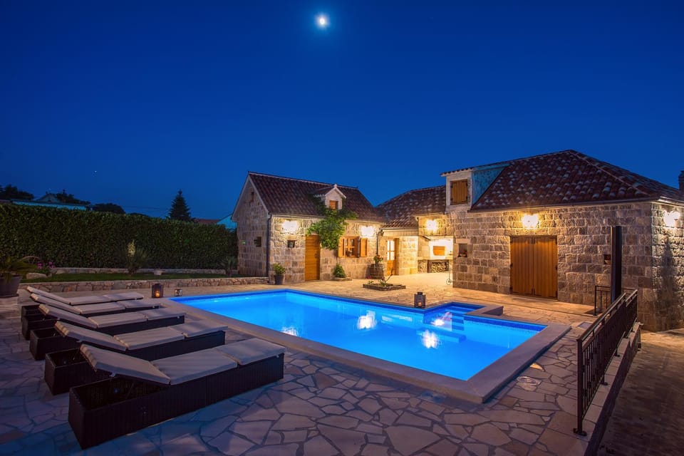 Property building, Night, Natural landscape, Pool view, Swimming pool, sunbed