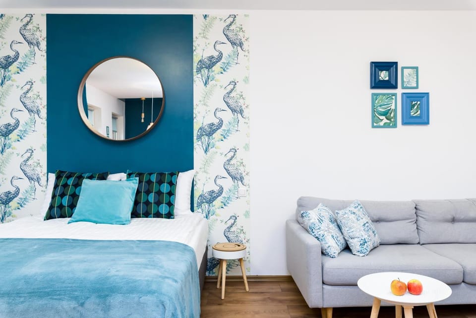 Bed, Living room, Seating area, Bedroom
