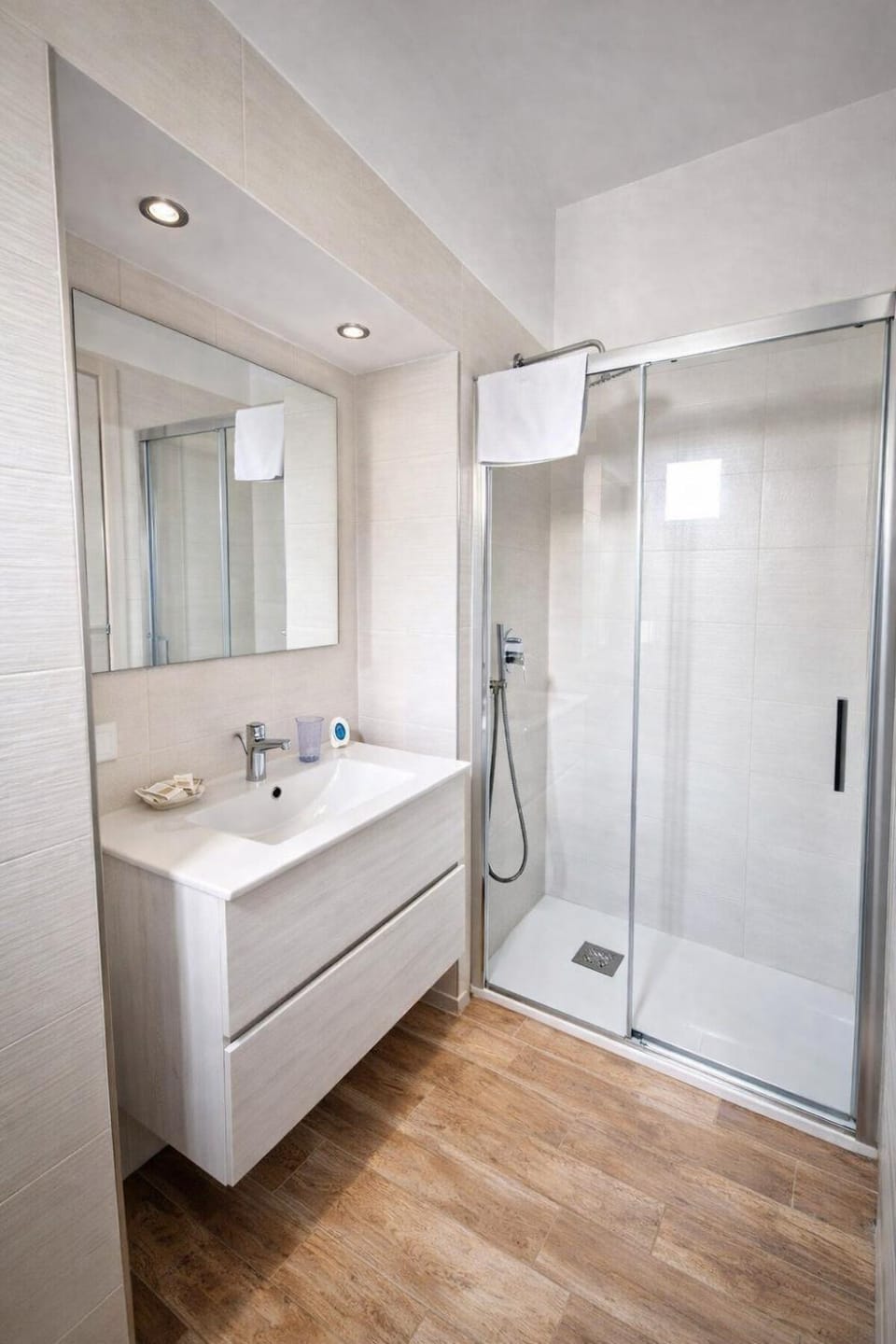 Shower, Toilet, Bathroom, bidet, hair dryier, towels