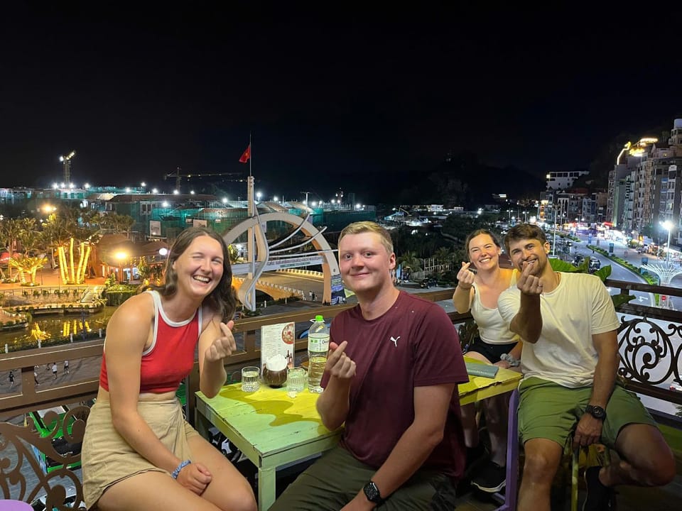 Night, View (from property/room), Balcony/Terrace, Lounge or bar, Guests, City view, Drinks, Alcoholic drinks, group of guests
