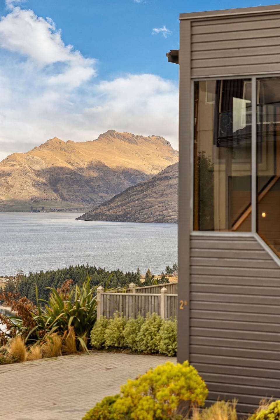 Property building, Nearby landmark, Spring, Day, Natural landscape, Lake view, Mountain view