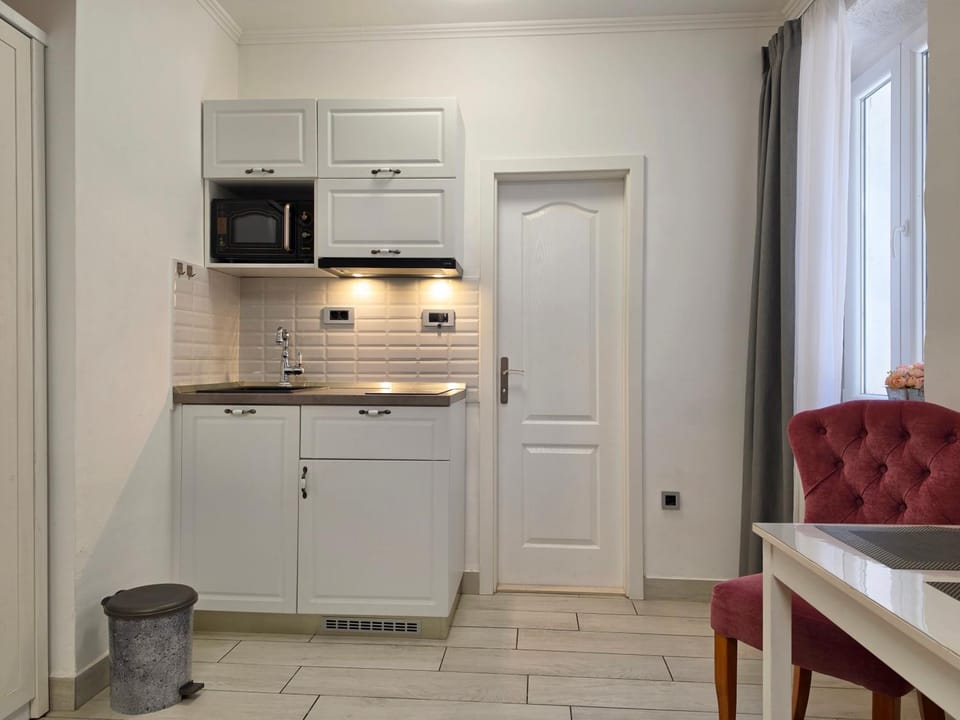Kitchen or kitchenette, stove