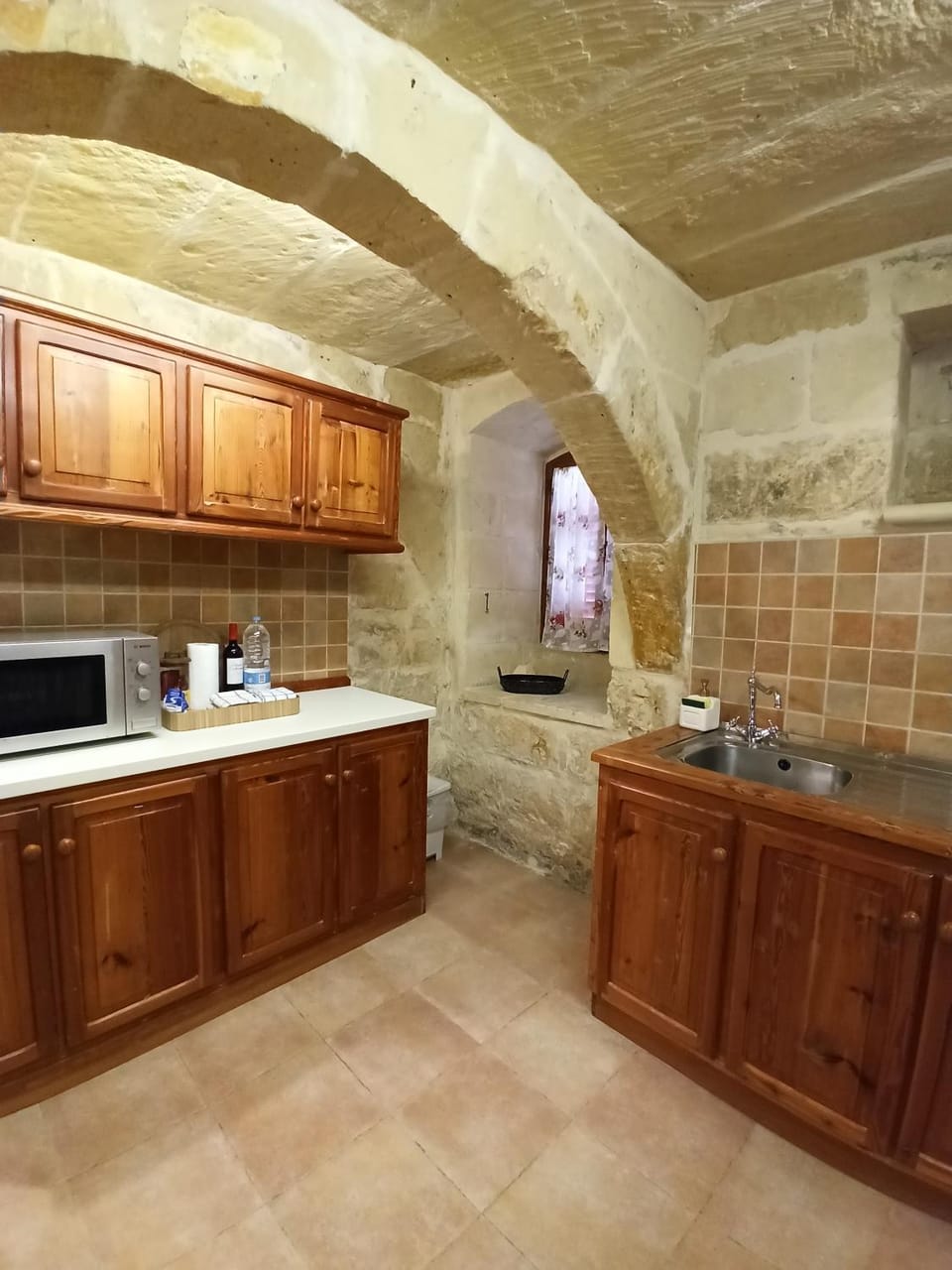 Kitchen or kitchenette, Street view, microwave, stove, toaster, kitchen