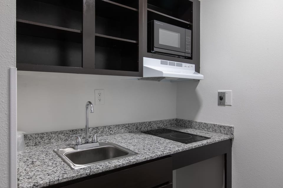 Kitchen or kitchenette, stove, kitchen