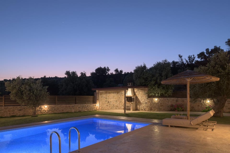 Property building, Patio, Night, Pool view, Swimming pool, sunbed