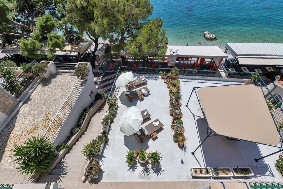 Patio, Facade/entrance, Bird's eye view, Balcony/Terrace, Beach, Sea view