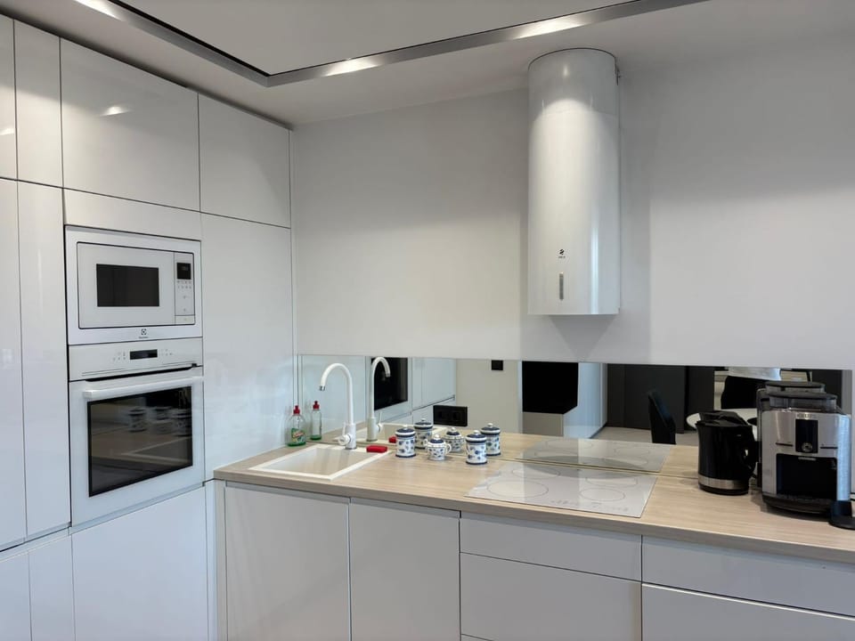 Beautiful apartment with air conditioning, balcony and underground garage Apartment in Krakow