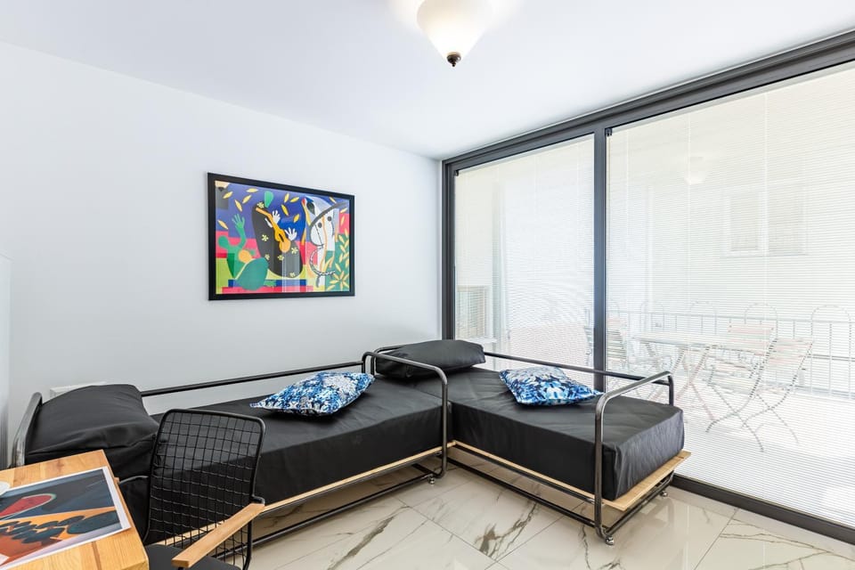 Bed, Living room, Seating area, Bedroom